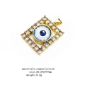 Detail view of gold copper evil eye pendant with zircon inlay and product dimensions - Rectangle - White Eye