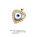 Macro shot of copper heart evil eye pendant with colorful cubic zirconia stones - Heart - White Eye