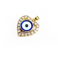 Macro view of gold heart-shaped evil eye pendant with cubic zirconia micro-pave - Heart - Blue Eye
