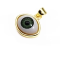Macro detail of 3D evil eye pendant with golden metal frame and green resin iris - Green