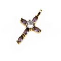 Macro detail of gold cross pendant with purple marquise and clear round cubic zirconia - Purple