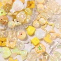Kit per gioielli fai-da-te con perline in resina gialle e bianche a forma di cuore e stelle - Giallo Misto
