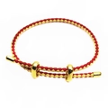 Detail of adjustable braided red and yellow cord bracelet with gold sliding metal clasp - Red And Yellow