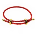 Detail of red braided fiber bracelet showing the double-strand spiral texture and gold clasp - Red & Orange