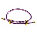 Detail of pink and purple braided cord bracelet with adjustable gold metal sliders - Purple Pink