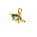 Golden turtle pendant featuring a marquise-cut light blue gemstone inlay for jewelry - A Blue