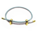 Detail of 3mm braided blue and pink cord bracelet with adjustable gold metal hardware - Blue Pink