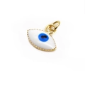 Macro detail of 10mm evil eye charm with blue enamel inlay and gold textured frame - White