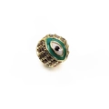 Macro shot of 14K gold plated Evil Eye bead charm with micro-p镶 inlaid crystal details - 14K Gold / Green