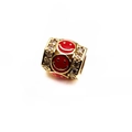 Macro shot of 14K gold-plated spacer bead with red enamel smiley faces and zircon stones - Smiley Red Hat