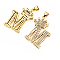 Gold-plated crown letter M pendant featuring micro-pave cubic zirconia stones - Letter M