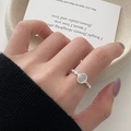 Detailed view of elegant silver adjustable ring with oval gemstone and threaded band - Open Adjustable / Screw Chain Beaded Border Oval Grey Rhinestone Ring (JZ5135) / Silver