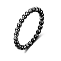 Detail view of a minimalist 2mm black beaded titanium steel ring with polished finish - Size 5 / Black