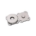 Macro detail of plum blossom magnetic snap fasteners for bags with four sewing holes - Silver