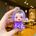 Cute purple translucent girl figurine with colorful flowers inside on a hand - Large Luminous Bubble Bead Devil Girl / Purple