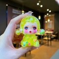 Detailed close-up of a yellow translucent cartoon elf figure with colorful flower patterns - Large Luminous Bubble Bead Devil Girl / Yellow