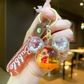 Portachiavi con Capybara liquido a forma di Mickey e figurina con fragola - Stile Testa di Topolino (Bambola Fragola)
