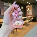 Pink liquid glitter bear keychain detail with small bell and ring held by hand - Lobster Clasp Style / Noctilucent Flash Pink Style