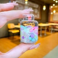 Detail of liquid sand snowflake keychain with macaron beads and pink buckle clasp - Snowflake Gas Tank / White Without Buckle
