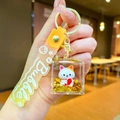 Detail of cute cat figurine inside clear acrylic keychain with orange gradient wrist strap - Gradient Strap Koi Cat Cube