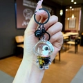 Portachiavi liquido astronauta con figura galleggiante e paillettes a stella dorate in nero - Stile Chiusura a Moschettone / Hardware Nero [Skateboard] Astronauta Nero Oro