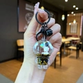 Portachiavi creativo con astronauta, campanellino nero e sabbie mobili dorate fluide - Stile Chiusura a Moschettone / Hardware Nero [Pianeta] Astronauta Nero Oro