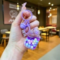 Purple quicksand bottle keychain with acrylic beads and metal bell on a purple clip - Purple Gas Tank With Colorful Beads