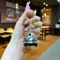 Detail of cute floating astronaut keychain with blue space traveler in liquid bottle - Lobster Clasp Style / Gold Hardware [Guitar] Black Gold Spaceship