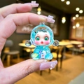 Blue transparent cartoon doll keychain with floral details and crystal-clear resin texture - 1 Piece / Small Luminous Bubble Bead Devil Girl (Green)