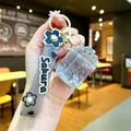Detail of Sakura themed keychain with gray silicone strap and mini resin milk tea cup charm - Sakura Strap Gray Luminous Dried Flower Iceberg Cup