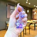 Portachiavi a stella con sabbie mobili viola glitterate e ciondolo a campanellino - Stile Mini / Chiusura a Moschettone / Viola