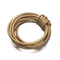 Close-up of golden braided PU leather cord bracelet with decorative woven knot detail - Gold
