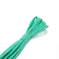Nahaufnahme eines minzgrünen 5mm Polyesterseils mit weißem Punktmuster und Geflecht - 2m/Pack Ca. 15g / Orchideengrün mit Weißen Punkten
