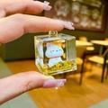 Creative lucky cat acrylic cube keychain with liquid gold glitter and white cat figurine - Without Buckle (Happy)
