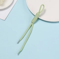 Detail of light green braided polyester lanyard with spiral wrap and heat-shrink tubing ends - Green