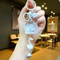 Porte-clés cygne lumineux avec boule de sable mouvant et sequins en étoile - Style Mousqueton / Blanc