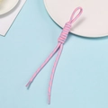 Detail of pink and blue braided polyester cord with loop and aglet ends for DIY use - Pink With Blue Dots