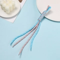 Detail of hand-woven pink and blue paracord lanyard with durable plastic cord ends - Pink And Blue Block