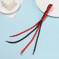 Macro detail of hand-woven red and black paracord lanyard with durable end caps - Red And Black Block
