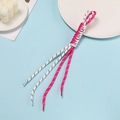 Close-up of colorful braided polyester cords with plastic tips on a blue background - Rose Red And White Block