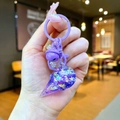 Detail of purple ice cream keychain with colorful glitter sequins and star powder - Purple Sparkling