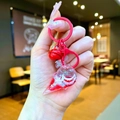Detail of red glitter-filled ice cream keychain with metal ring and small bell - Red Sparkling