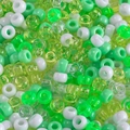 Macro shot of green and white large hole pony beads for DIY jewelry and hair crafts - Mixed Light Green