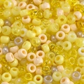 Macro shot of assorted yellow acrylic candy beads with large holes for DIY jewelry - Mixed Yellow