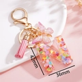 Dettaglio portachiavi lettera N con paillettes a cuore rosa e misure 42mm per 36mm - Rosa N