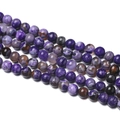 Close-up of natural purple agate beads showing detailed marble textures and polished finish - 1 Strand Approx 60 Pcs (6-6.5mm) / Purple Brown Flame Agate