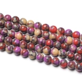 Macro shot of 8-10mm colorful polished Tang Sancai stone beads for DIY jewelry making - 1 Strand approx. 57 Pcs (6-6.5mm) / Red Mottled