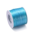 Detailed view of 0.8mm light blue elastic TPU bead cord wound on a white plastic spool - Approx. 0.8mm Thickness / 400m Length / Light Blue Zircon