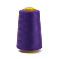 Close-up of deep purple 402 polyester sewing thread on a yellow plastic cone bobbin - Approx 100g / Deep purple