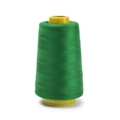 Close-up of bright green 402 polyester sewing thread on a yellow cone for garment DIY - Approx 100g / Green